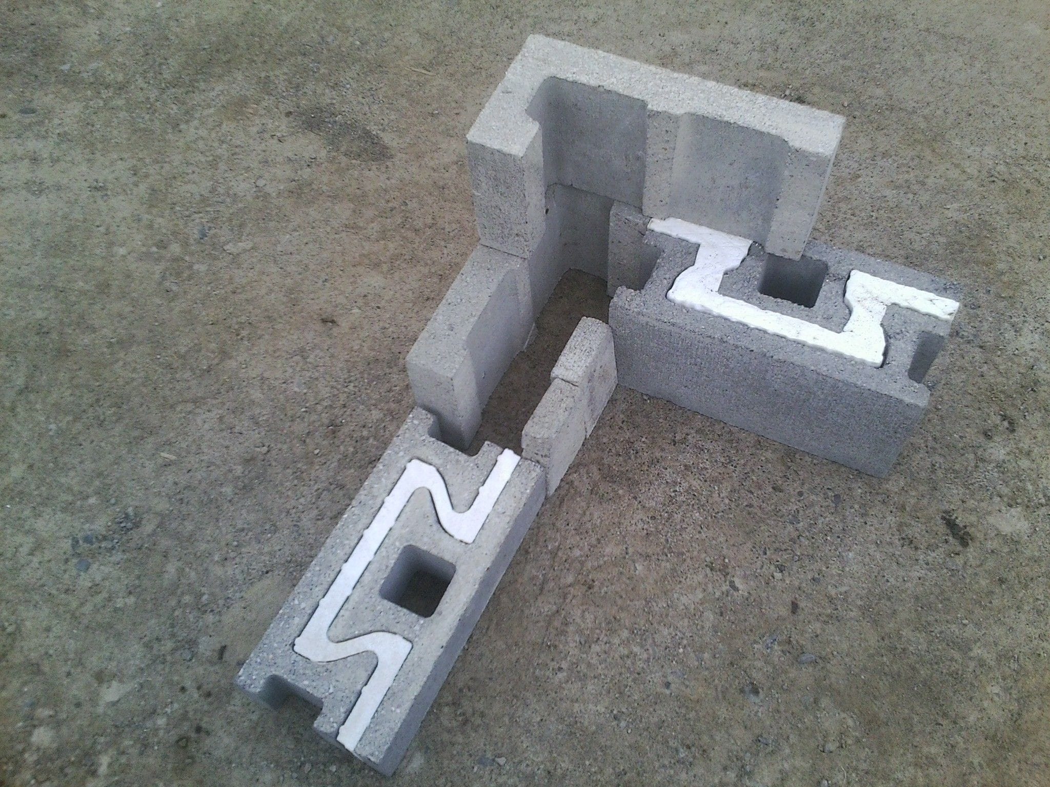 NRG insulated block continuous insulation at corners.
